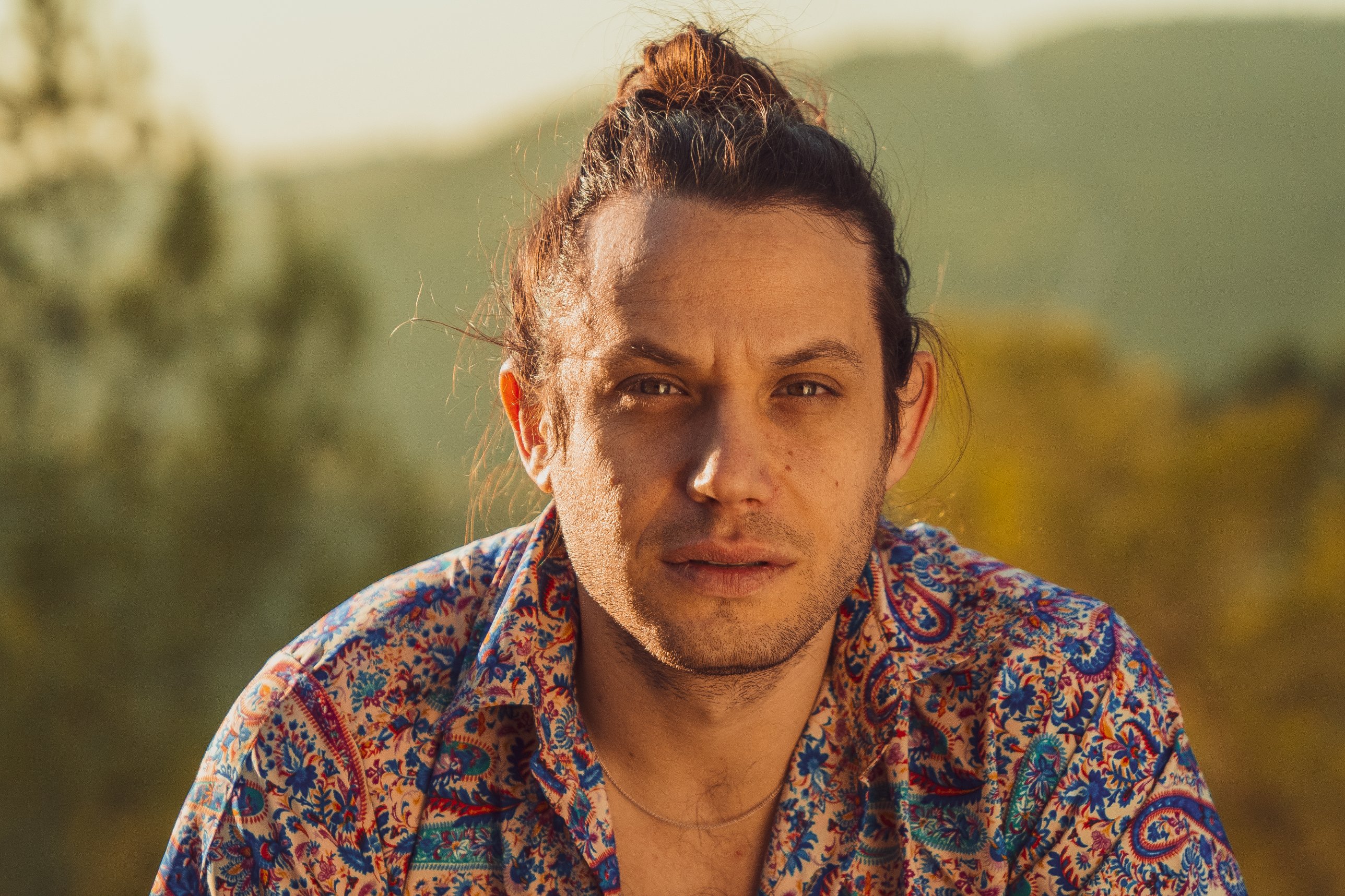 Uriah Witztum portrait in a paisley shirt